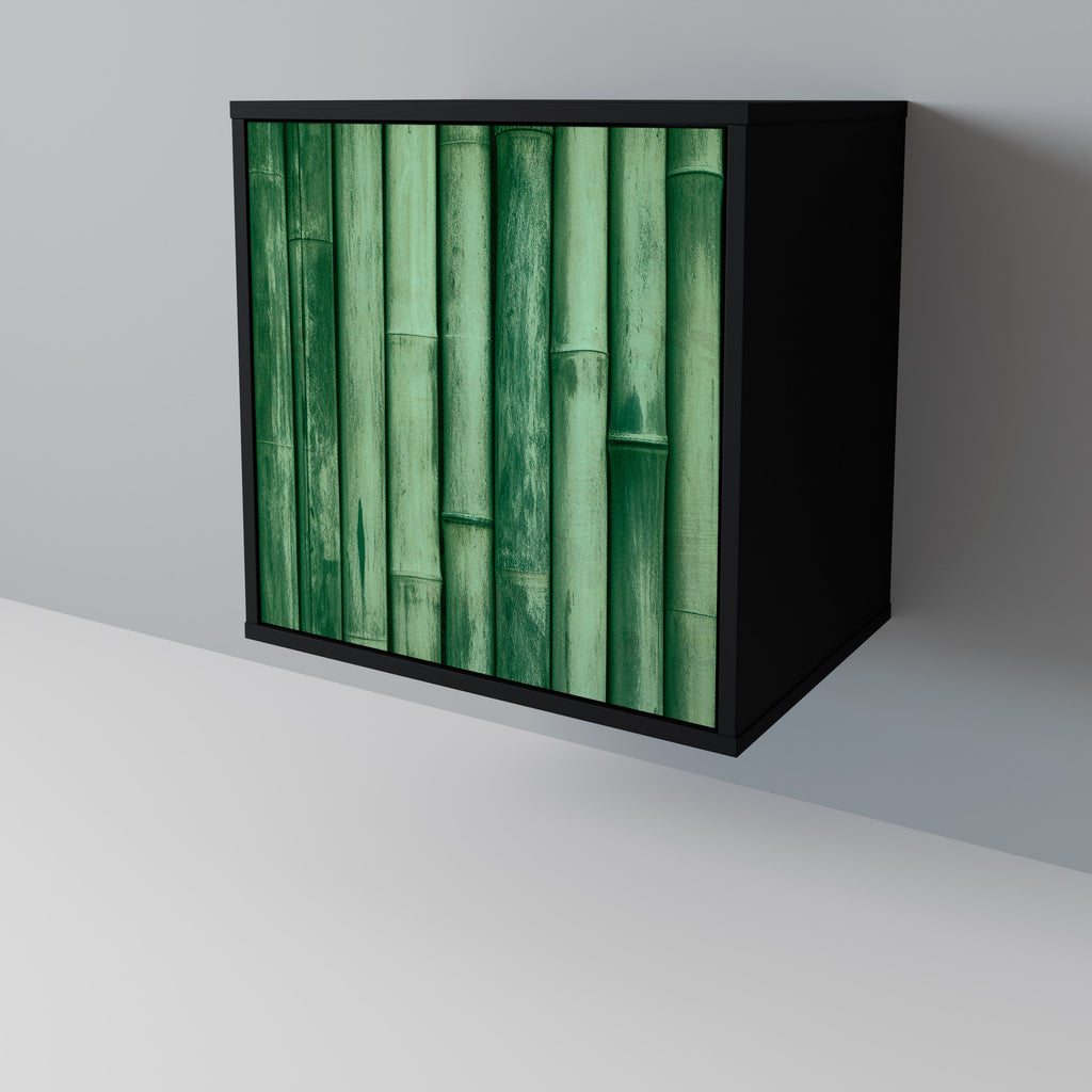 Aparador de una puerta en color verde natural con acabado negro.