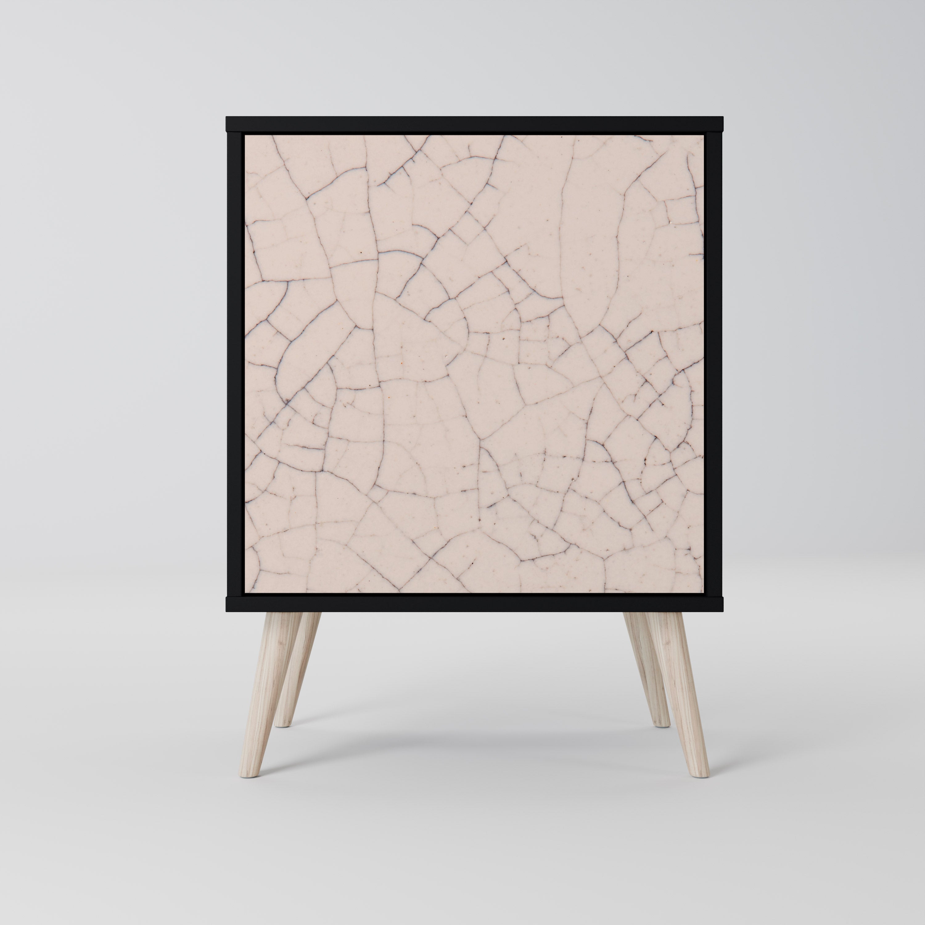 Aparador de 1 puerta con textura cerámica y acabado negro.