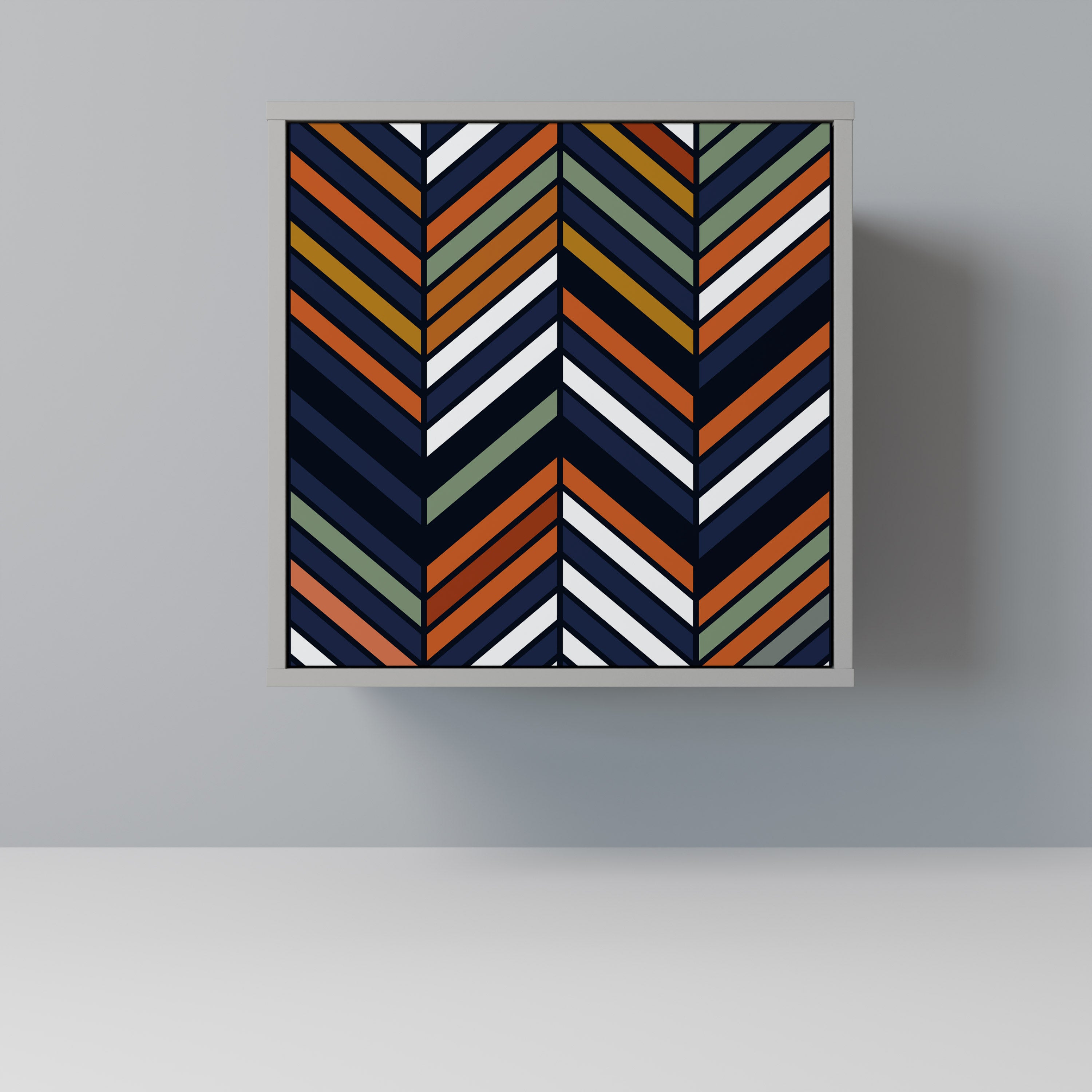 Aparador de una puerta con estampado patchwork vibrante en acabado gris