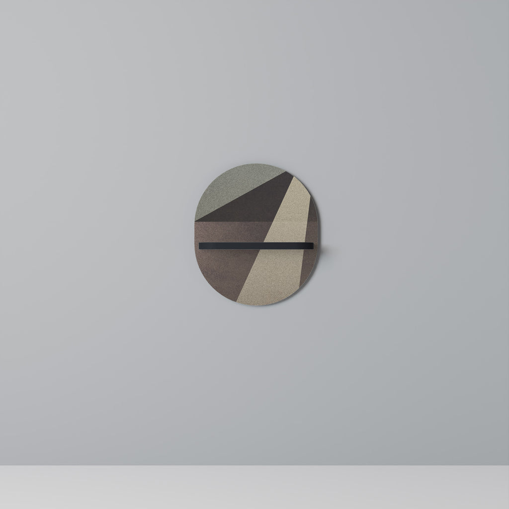 Estantería de arte ovalada con geometría beige y acabado negro