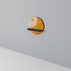 ORANGE ARRANGEMENT Round Art Shelf In Black Finish