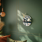 SHADOW SYMPHONY Oval Art Shelf In Black Finish