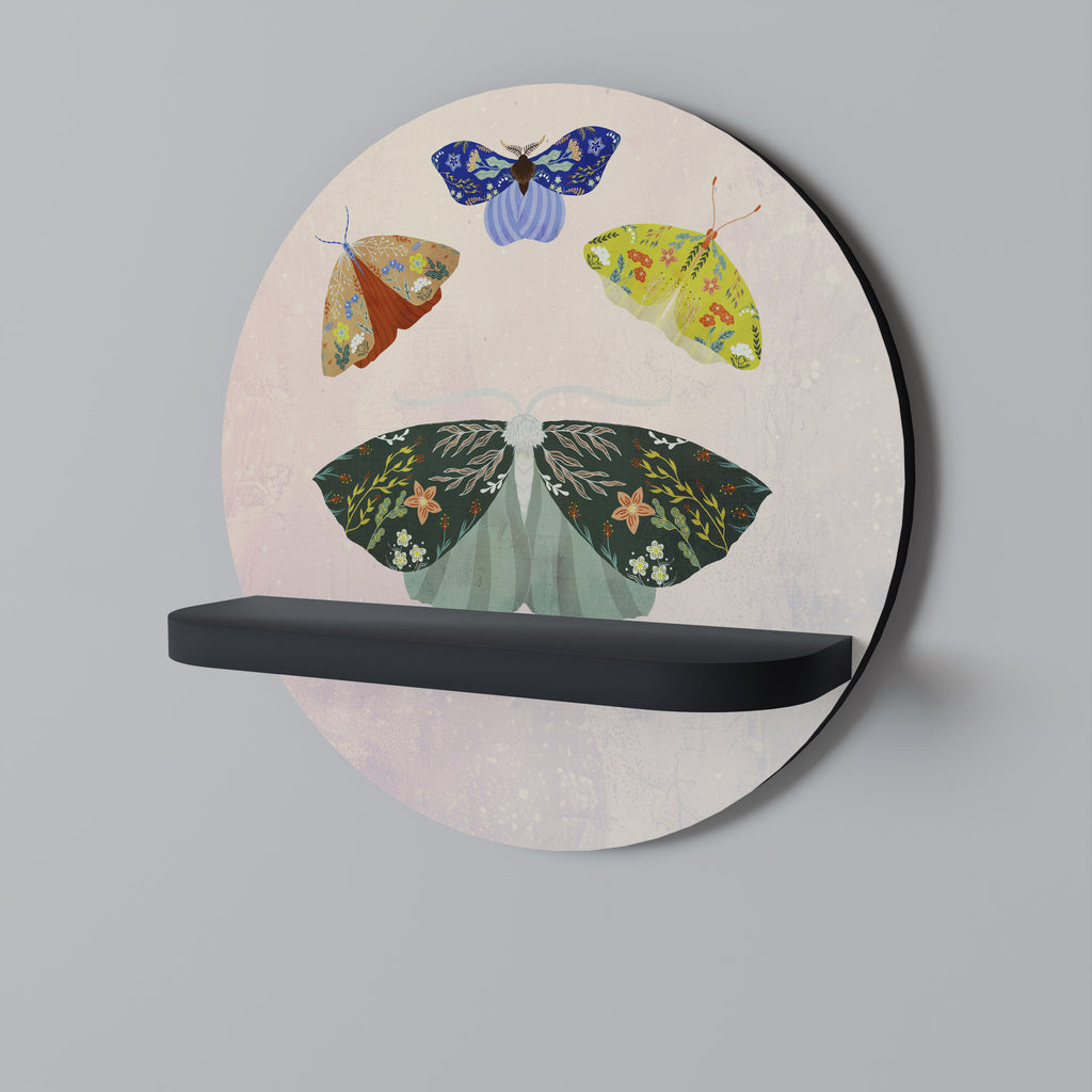 Estantería de arte redonda con acabado negro MOTH INTO THE LIGHT